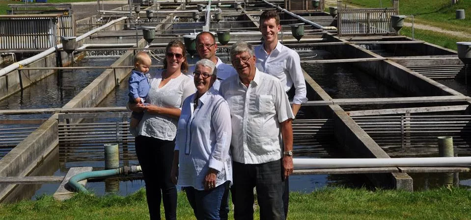 farming family at ontario fish farm