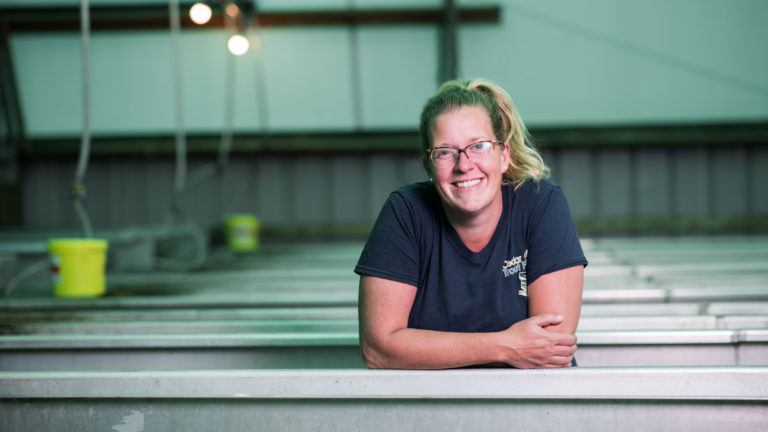 Woman on fish farm