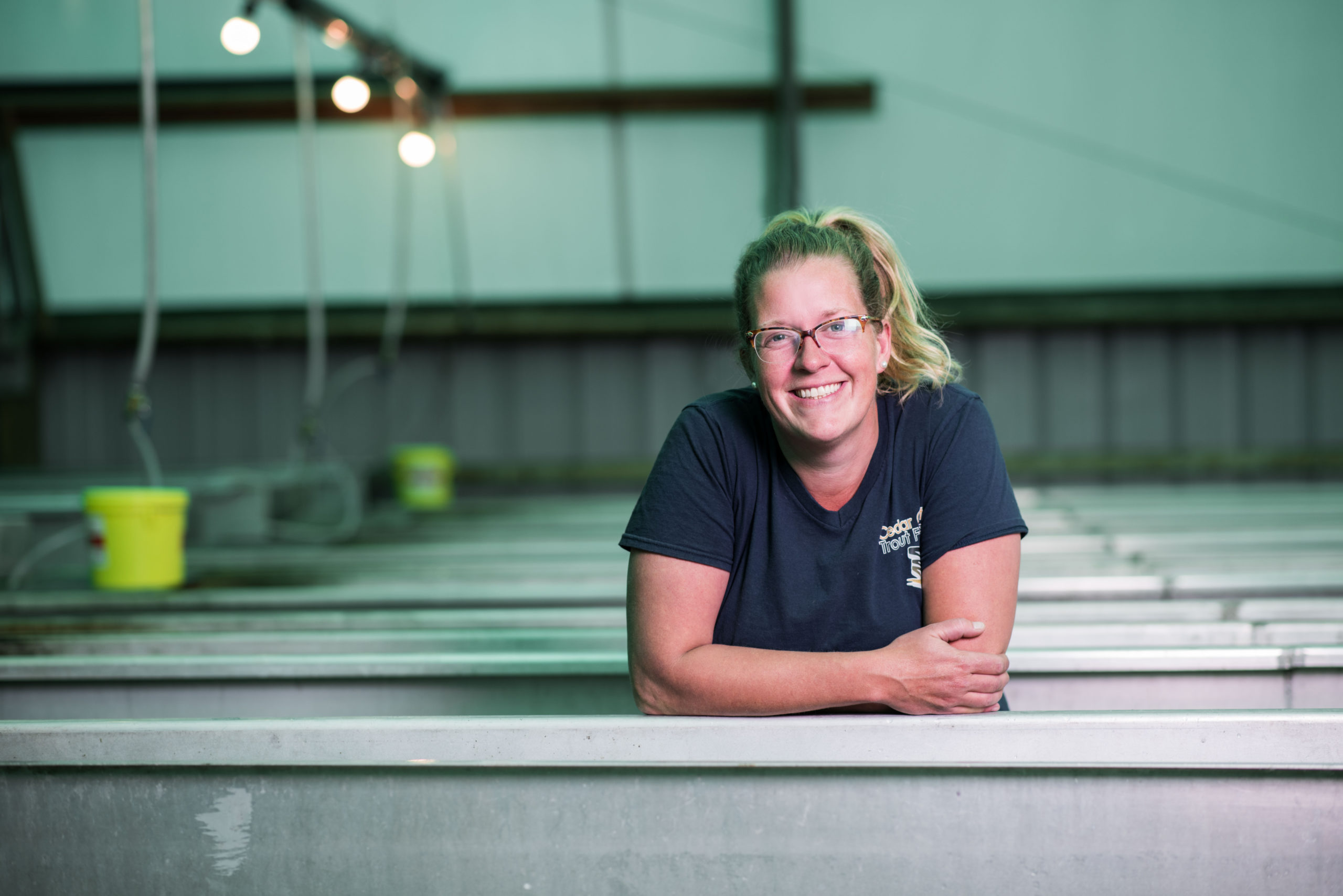 Woman on fish farm